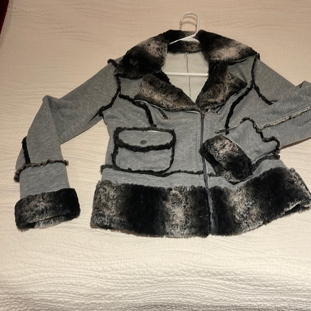 Chicos brand. only worn a handful of times. Very unique. Faux collar/cuffs.